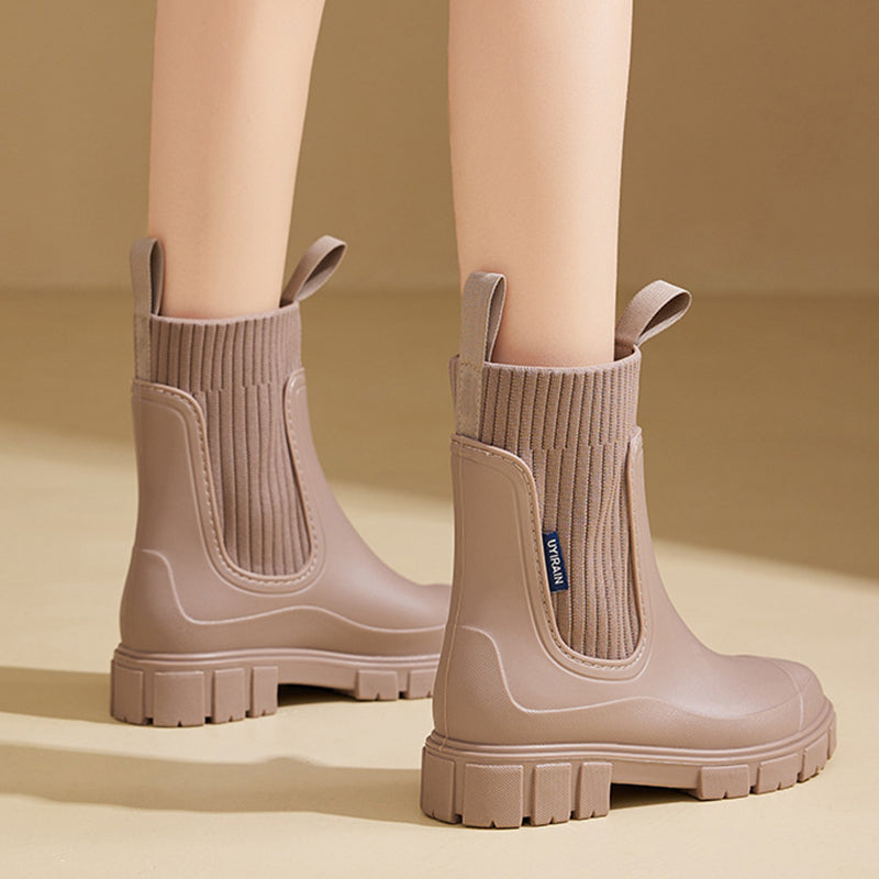 Waterproof women's outdoor footwear, thick sole, ultimate grip, comfortable for wet conditions.
