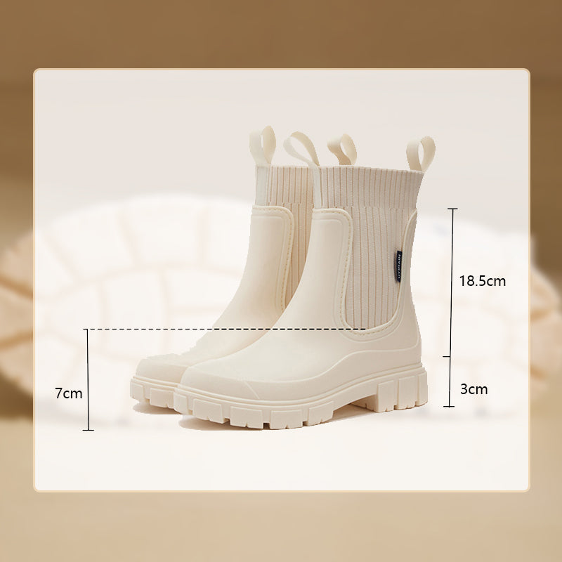 Ladies' puddle stomper rain boots, waterproof, anti-slip thick tread for comfort and grip.