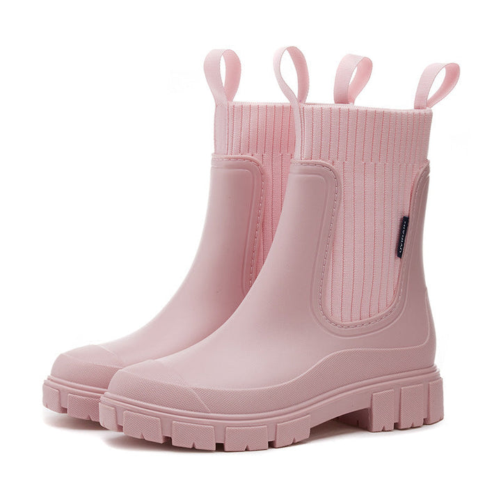 Anti-slip women's rain boots, thick tread sole for secure grip & comfort in wet weather.