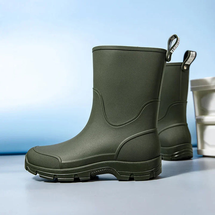 Black women's rubber boots, waterproof and comfortable, designed for outdoor footwear, gardening, and muddy trails
