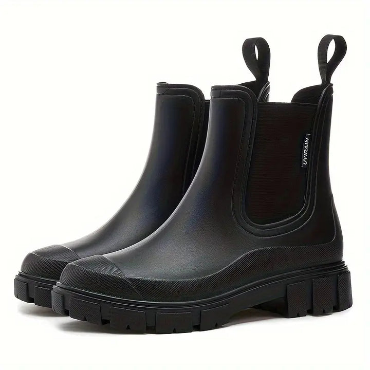 Autumn fashion: women's waterproof black Chelsea boots with lug sole, easy slip-on comfortable wear