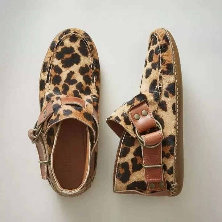 Women's comfortable slip-on shoes with a distinctive cat design, perfect for a fun fashion statement