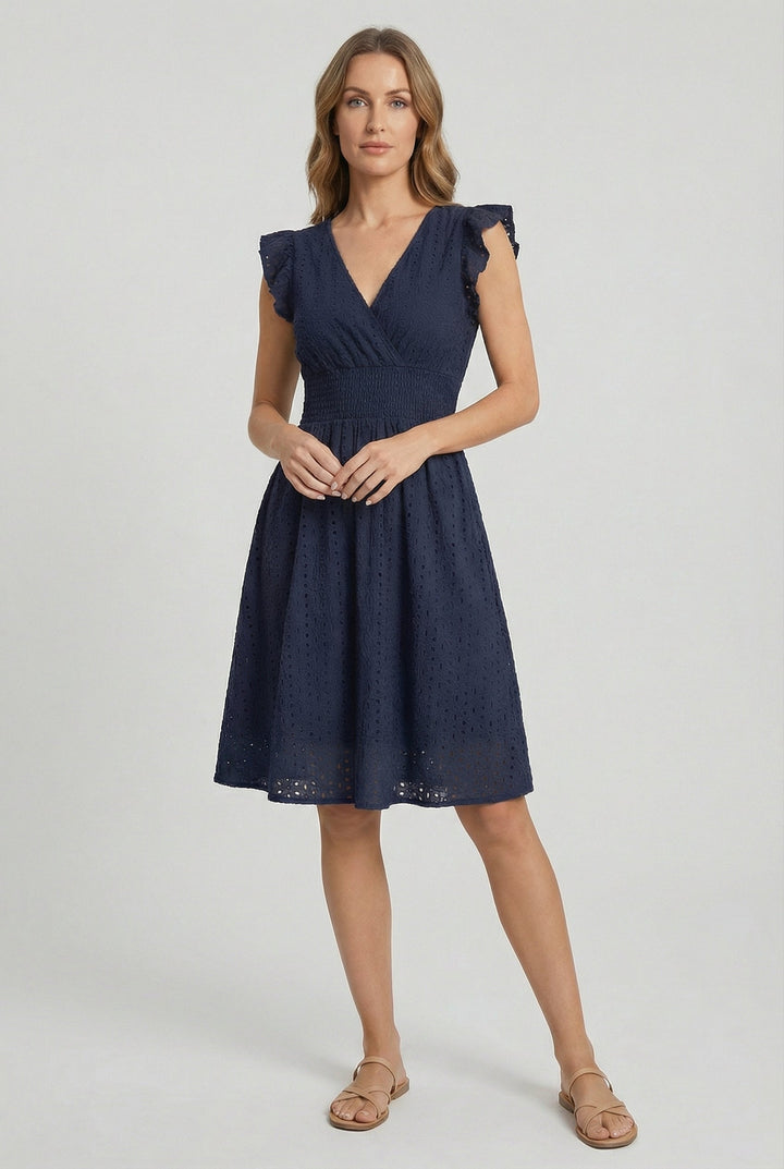 Women's eyelet summer dress, flared silhouette, ruffled sleeves, designed for comfort and style.
