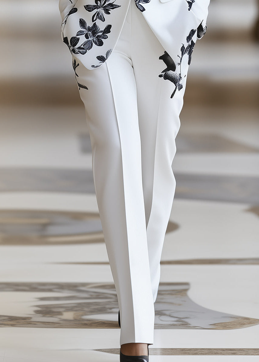 Professional & elegant women's white floral pant suit set with a tailored single-button blazer & matching trousers.