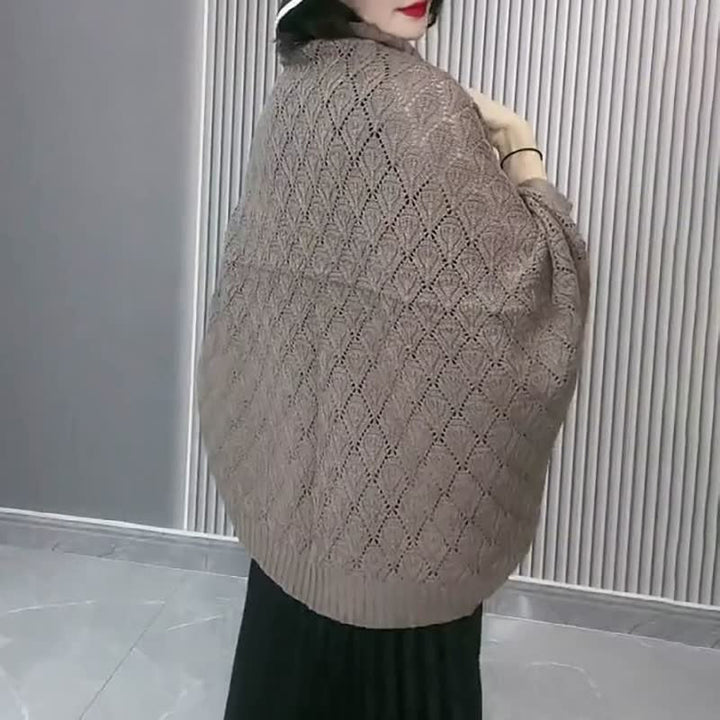 Stylish women's knit cardigan with diamond hollow-out pattern and short, versatile design.
