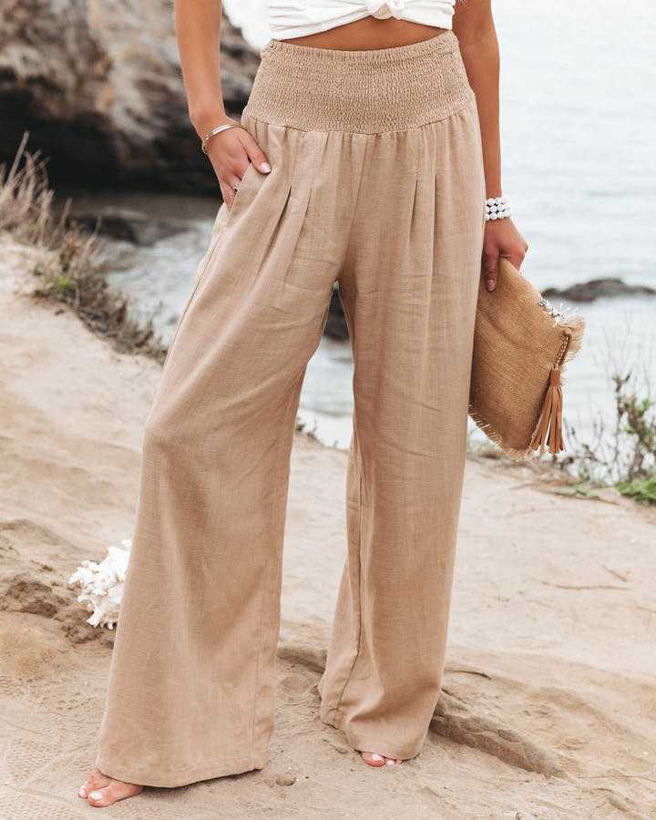 Women's wide leg beach pants with elastic waist for ultimate comfort. Perfect for summer fashion & resort wear.