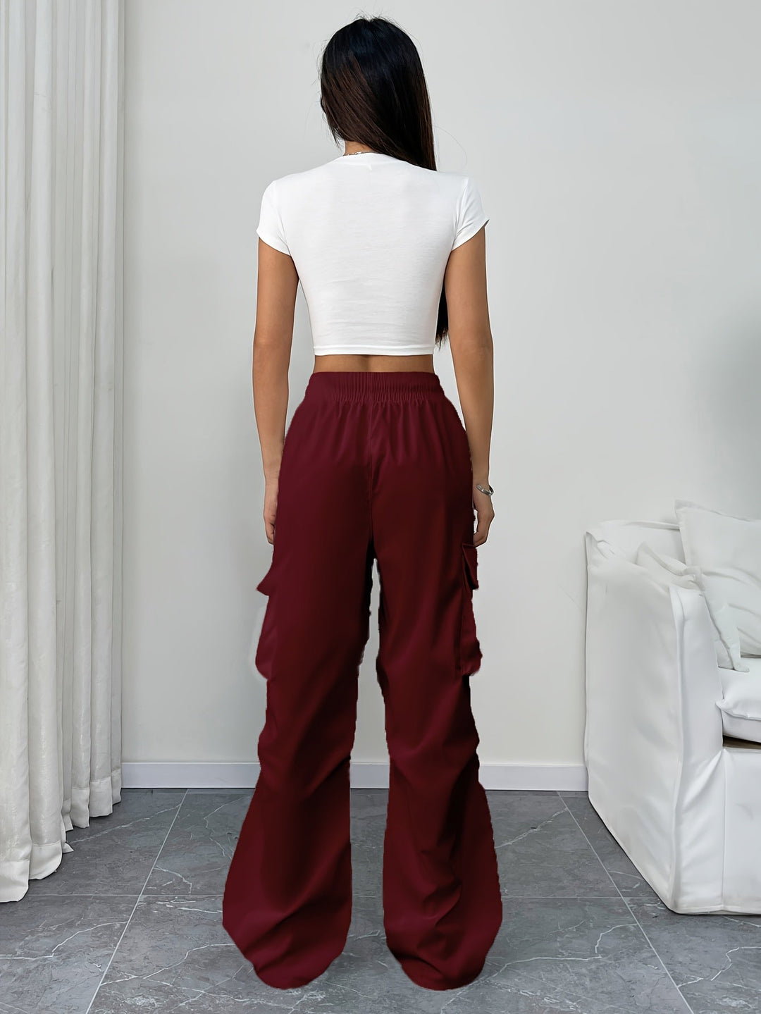 Comfortable women's wide leg cargo pants with adjustable drawstring waist. Trendy, relaxed fit for everyday.