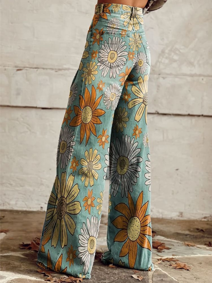 Stylish women's wide leg jeans featuring a vibrant floral print, high-waisted for a comfortable fit