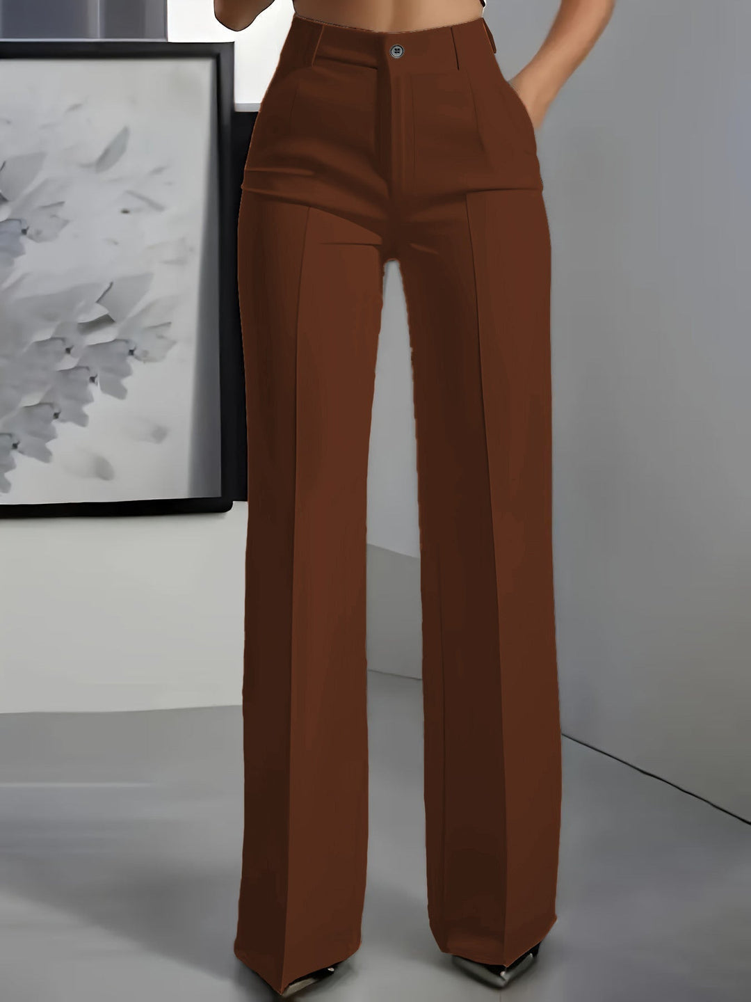 Structured women's wide leg trousers with high waist, providing a polished look for office or casual style.