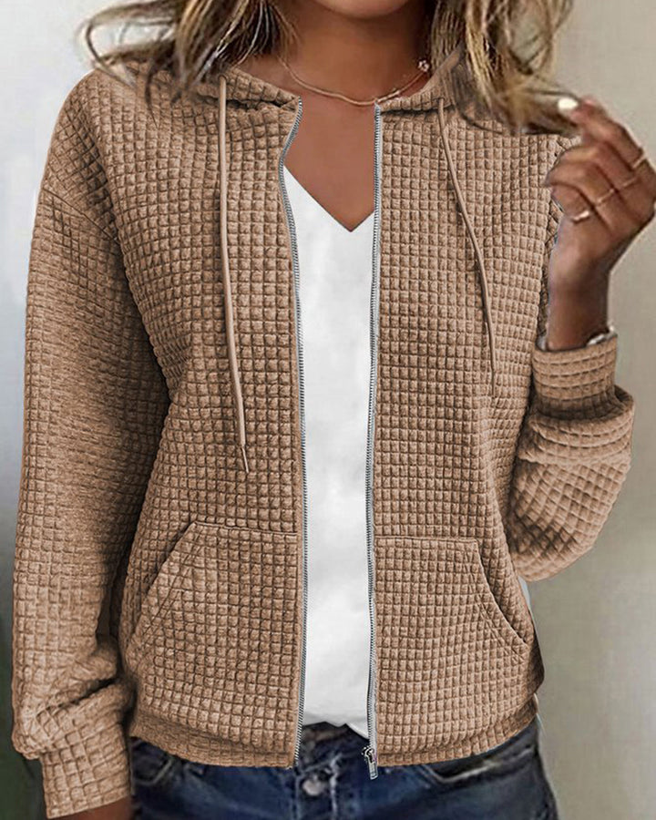 Versatile women's leisure jacket with zipper & pockets, offering comfort and style. A must-have piece for women's fashion.