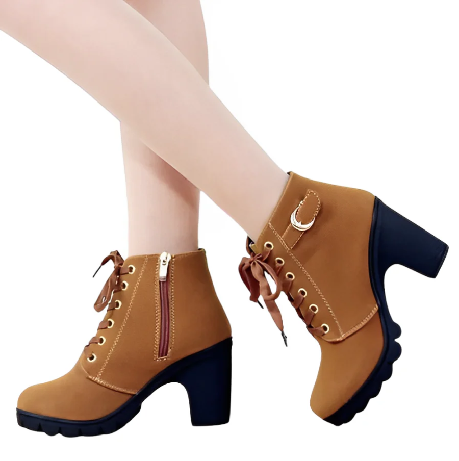 Stylish Yeda women's lace-up ankle boots. Modern design with a thick sole & heel for trendy fall footwear.