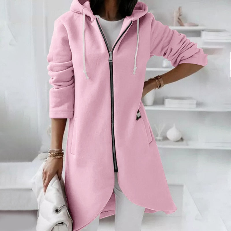 Women's zippered hooded vest in a cozy fabric, perfect for versatile layering and casual everyday style.