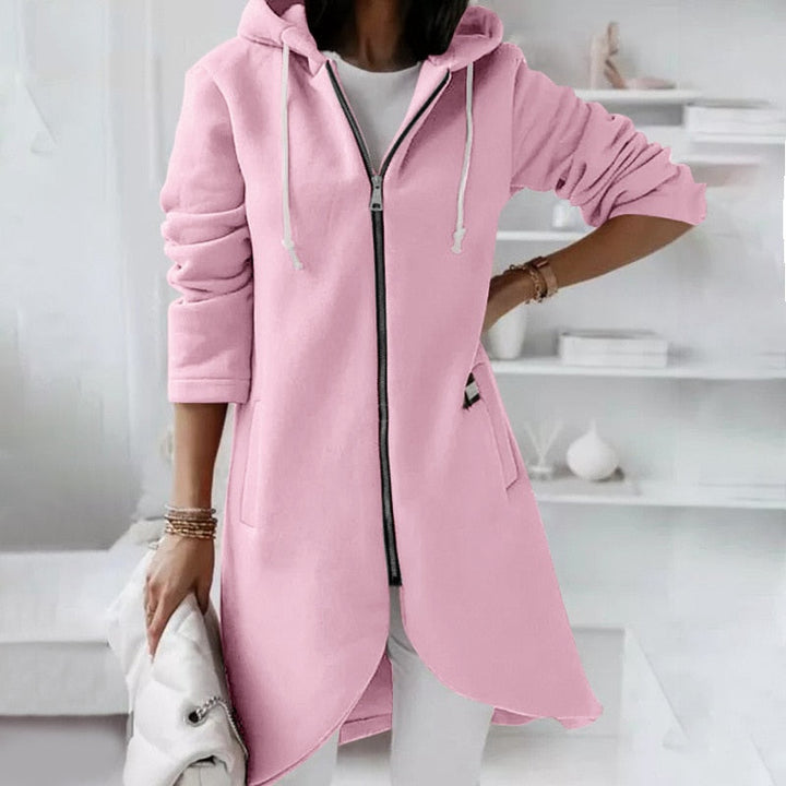 Women's zippered hooded vest in a cozy fabric, perfect for versatile layering and casual everyday style.