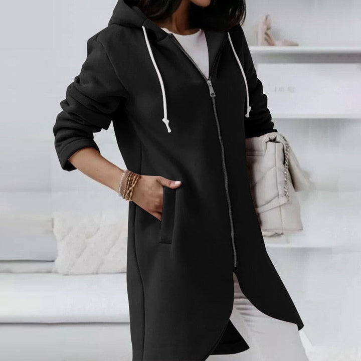 Comfortable women's vest with an adjustable hood and secure zip, a practical and fashionable layering piece.
