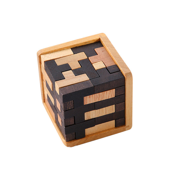 Solving a wooden brain teaser puzzle step-by-step, demonstrating problem-solving process