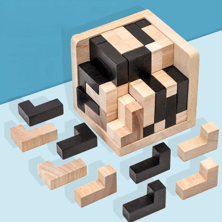 Person successfully completing a wooden brain teaser, feeling accomplished with the logic game