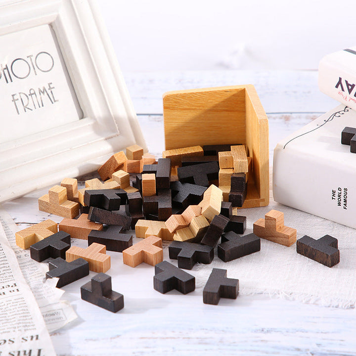 Close-up of a finished wooden brain teaser puzzle, highlighting the craftsmanship & logic game