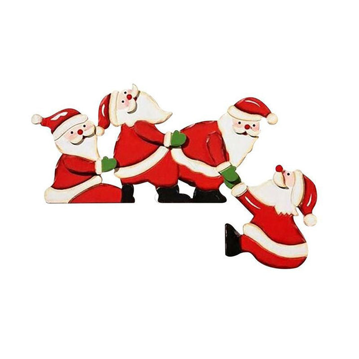 Close-up of wooden Christmas door frame decor featuring Santa, adding holiday cheer.