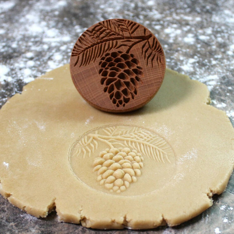 Solid wooden cookie stamp for baking, featuring a beautiful and functional design