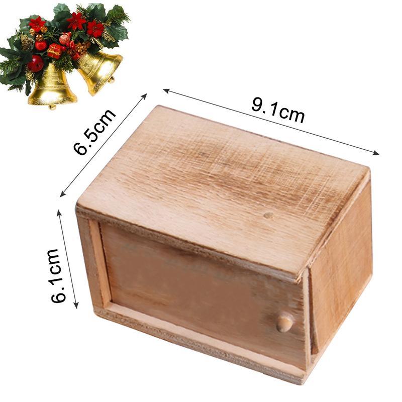 Hand holding a wooden prank scare box, ready for a funny surprise gag gift