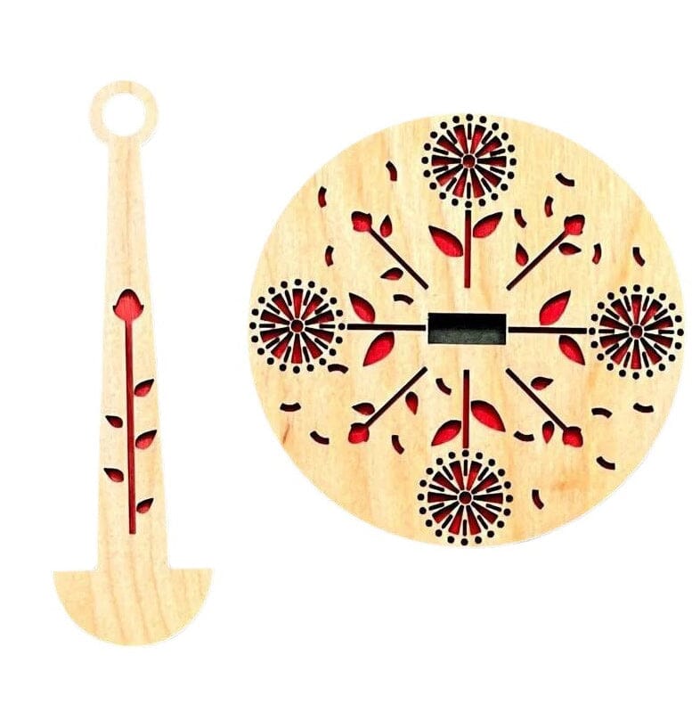 Close-up of a rotating wooden yarn ball holder, perfect for knitting and crochet projects.