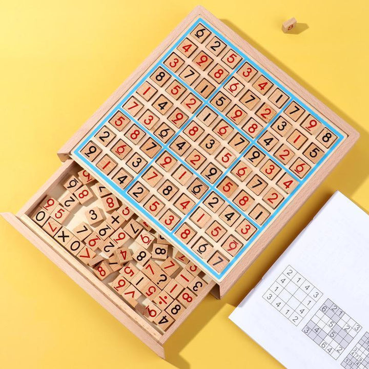 Hand placing a wooden number tile on a Sudoku board, highlighting the interactive brain teaser game
