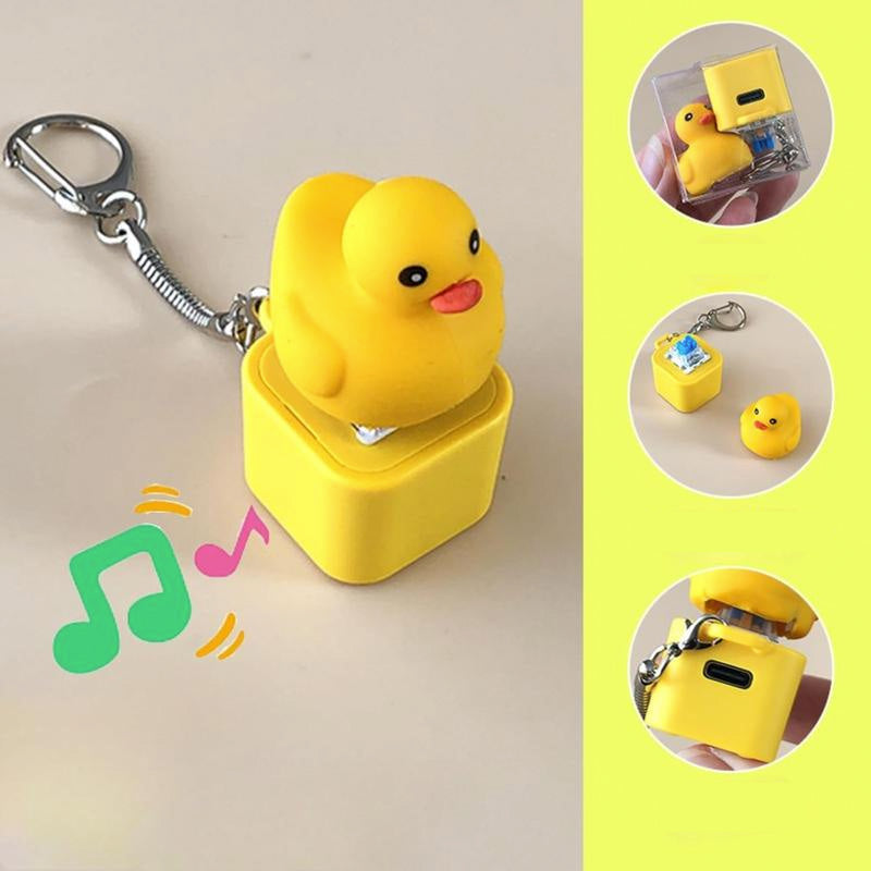 Close-up of a rubber duck sound fidget keychain, a portable stress-reducing toy.