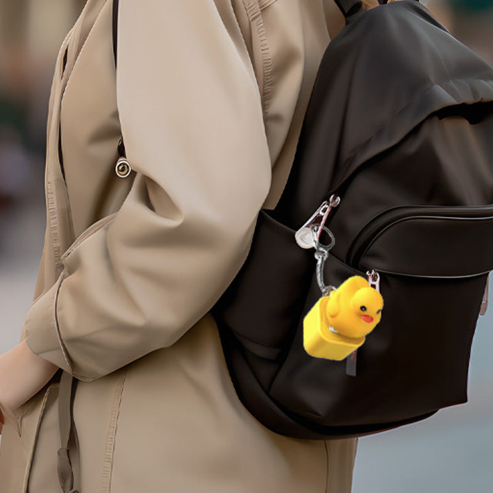 Unisex duck keychain that makes sound, a fun accessory and sensory toy.