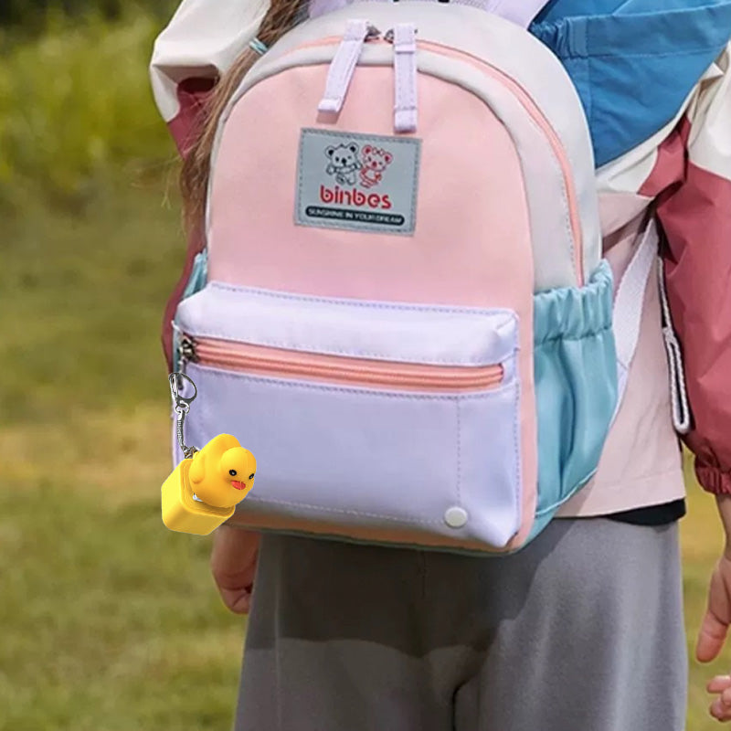 Bright yellow duck fidget keychain attached to keys, a practical stress reliever.