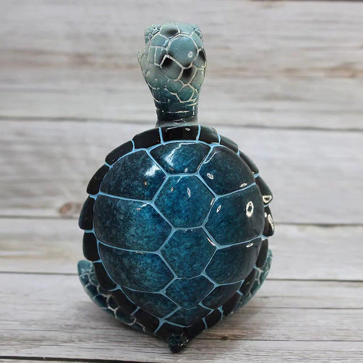 Zen-inspired sea turtle statue in a meditation pose, durable resin, enhances peaceful ambiance